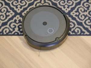 Modern Vacuum Cleaner on Wooden Flooring