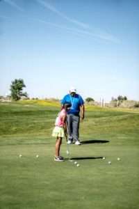 Girl Playing Golf