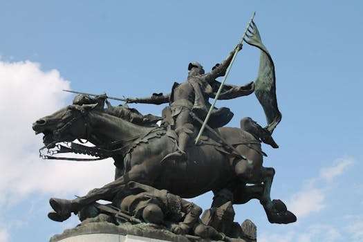 Bronze equestrian statue against the sky in Chinon, France.